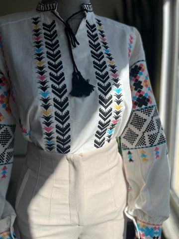 Ethnic Pattern Embroidered Blouse with Tassel Details – V-Neck Long Sleeve Bohemian Top
